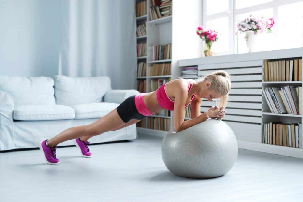 Girl doing mountain climbers on UGI ball