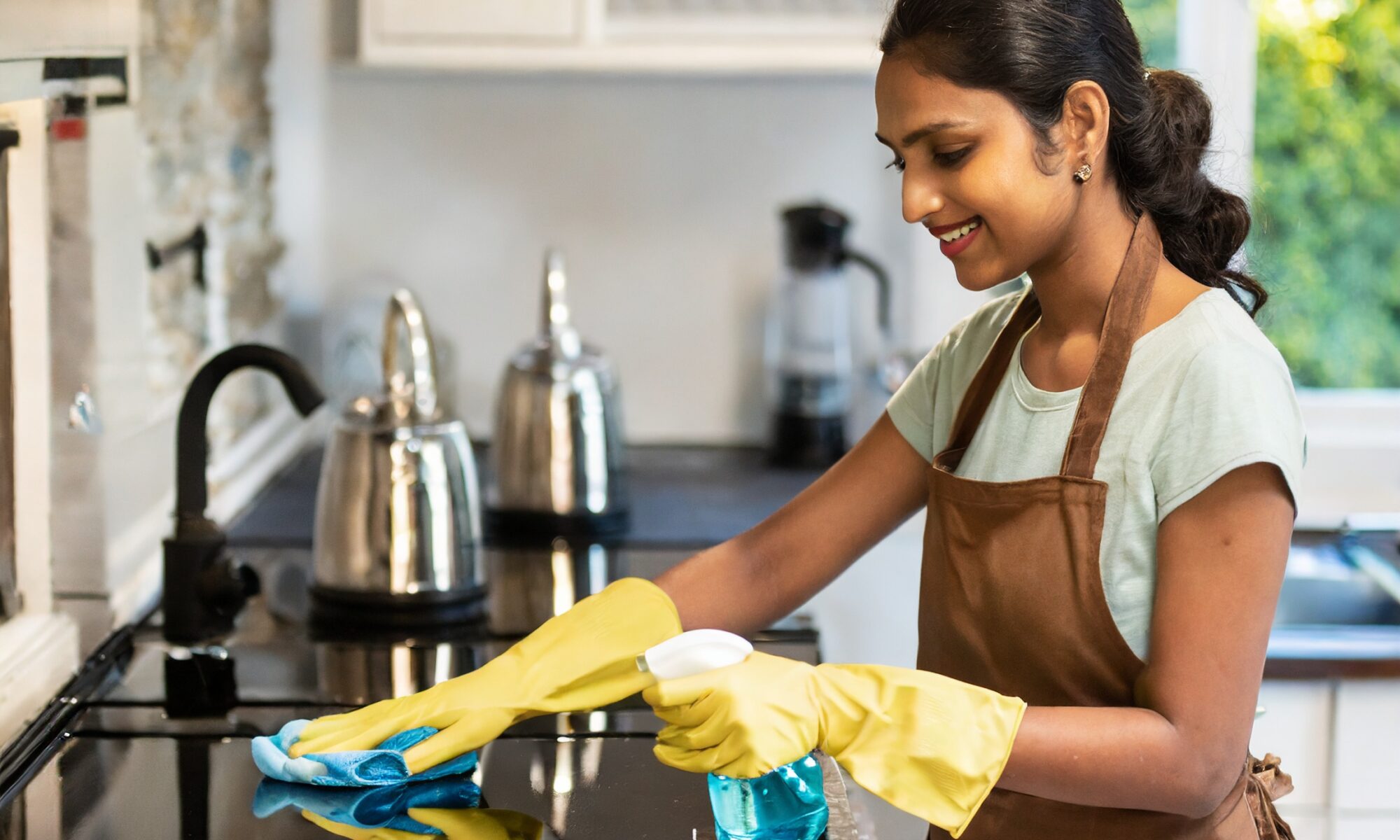 Indian helper cleaning utensils