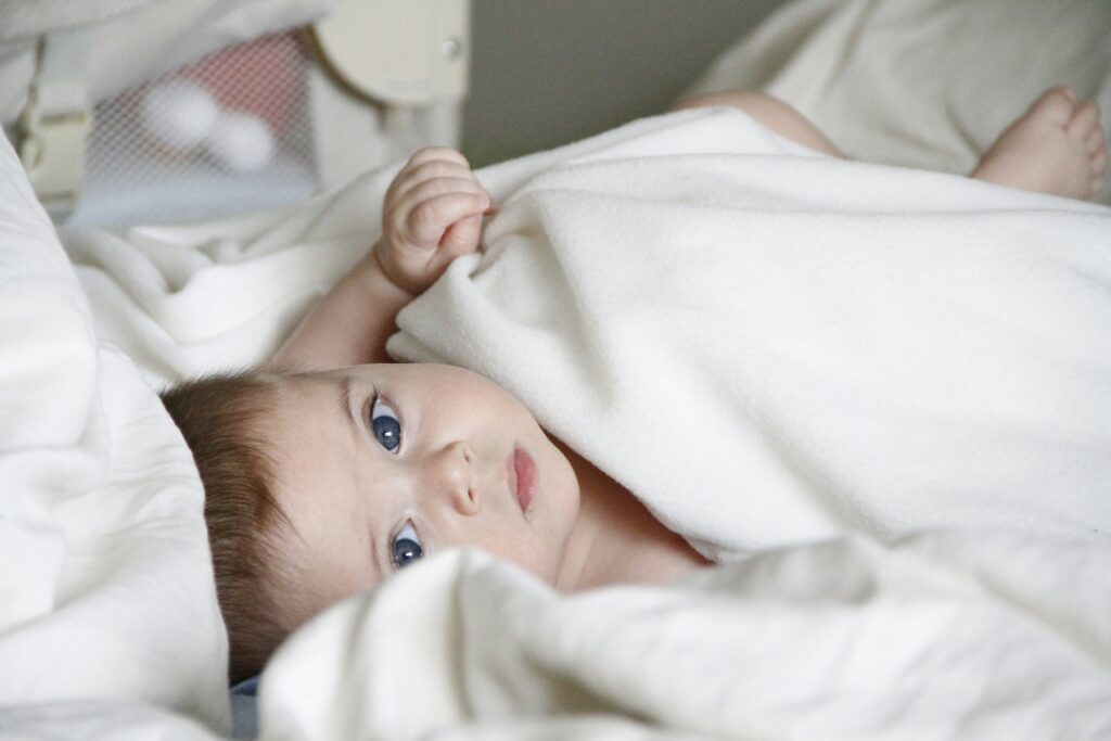 baby under the blanket 