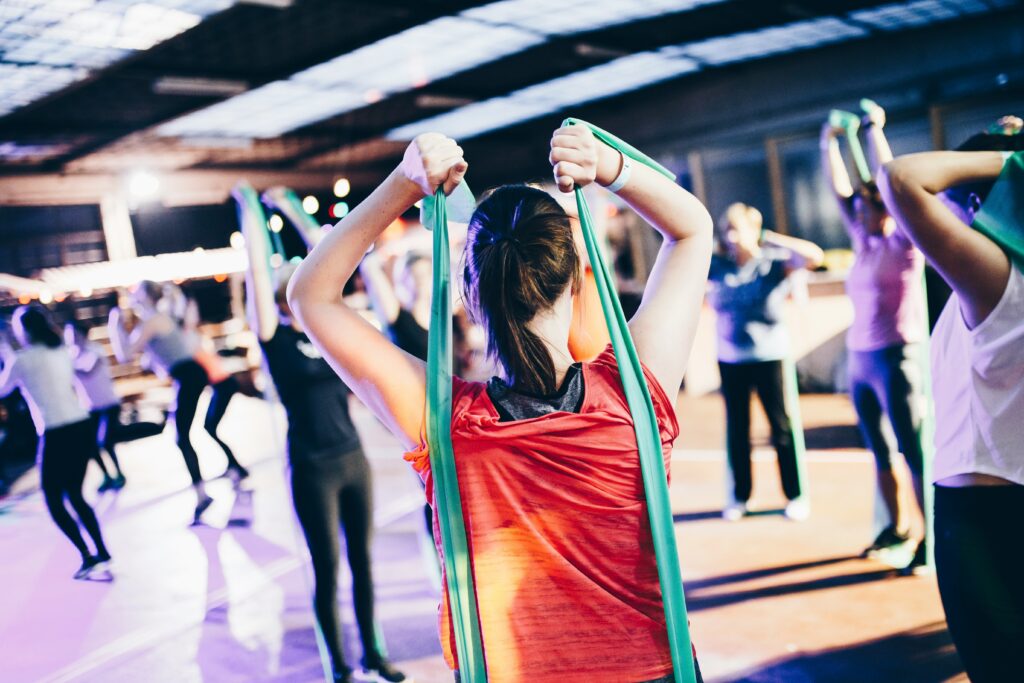 instructor leading a group fitness class