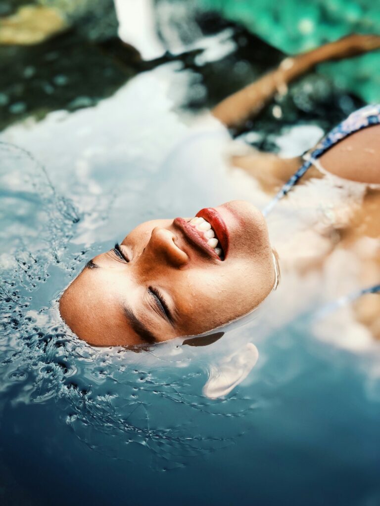 image of a lady floating in water 