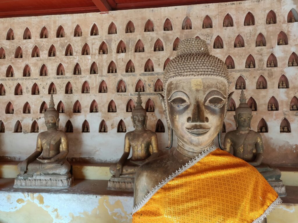 images of buddha in a Laotian Buddhist temple 