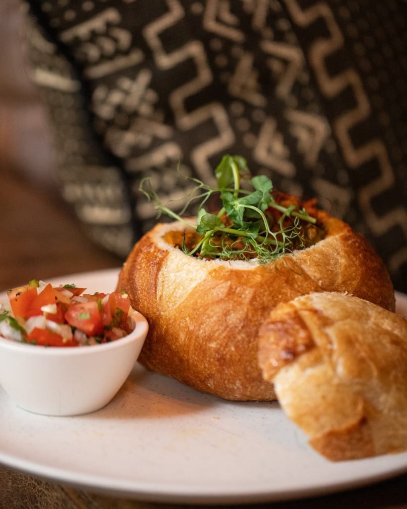 Bunny Chow is a hearty and aromatic South African stew that is incredibly reminiscent of familiar flavours like star anise and cloves