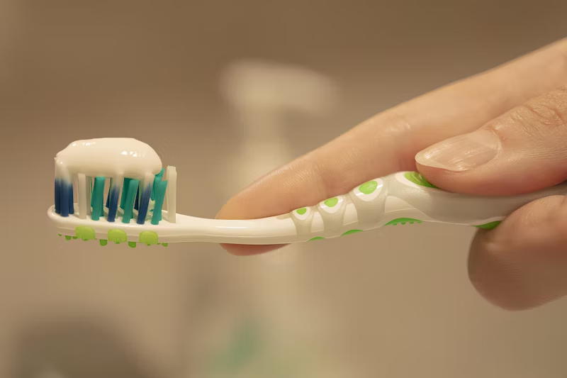 image of toothpaste on a toothbrush
